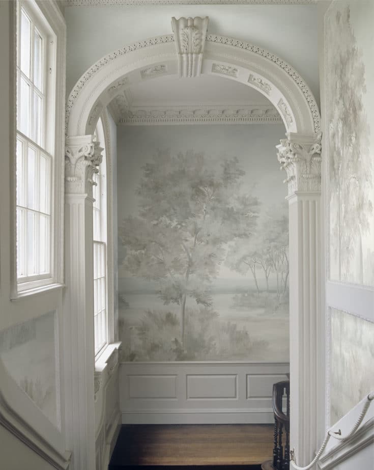 Stairway with classical columns and gray scenic mural wallpaper