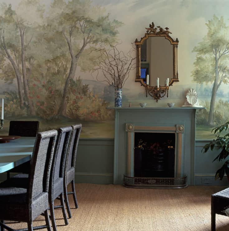 Dining room with fireplace and scenic mural wallpaper