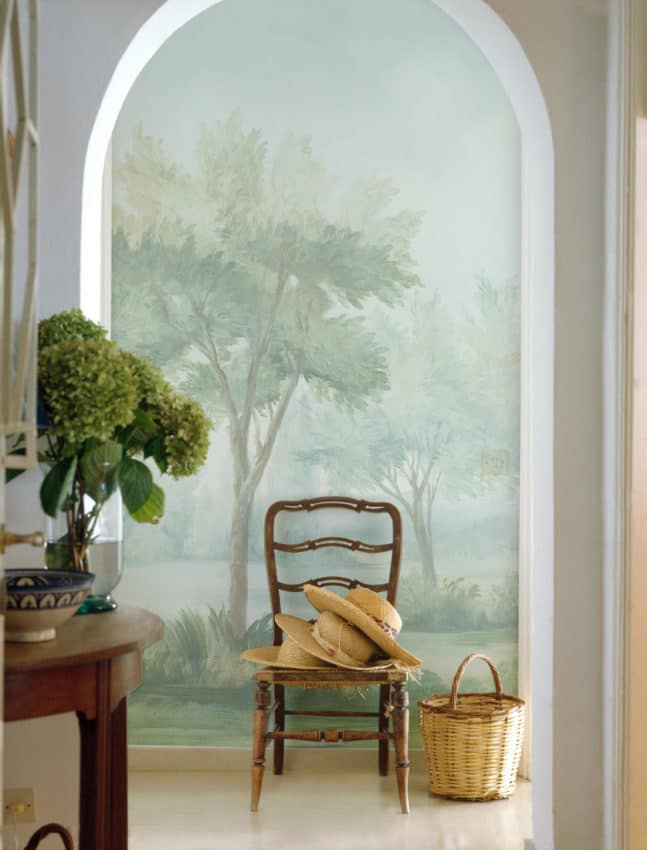 Hallway with wooden chair and scenic mural wallpaper