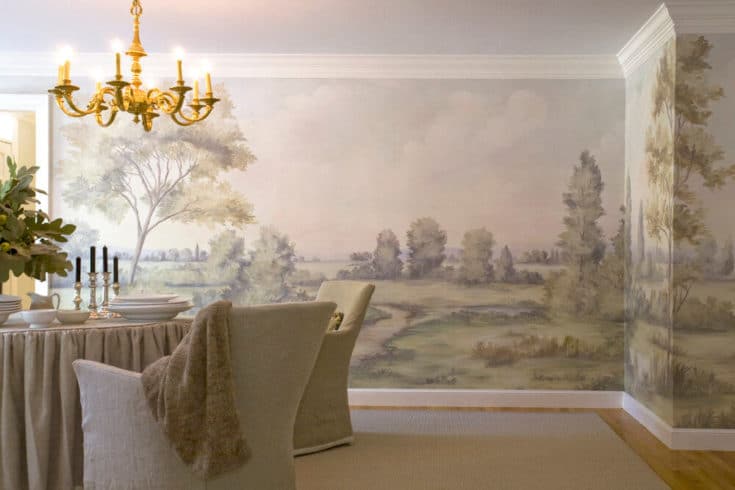 Dining room with scenic mural wallpaper