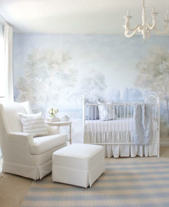 Bright nursery with dreamy scenic mural wallpaper