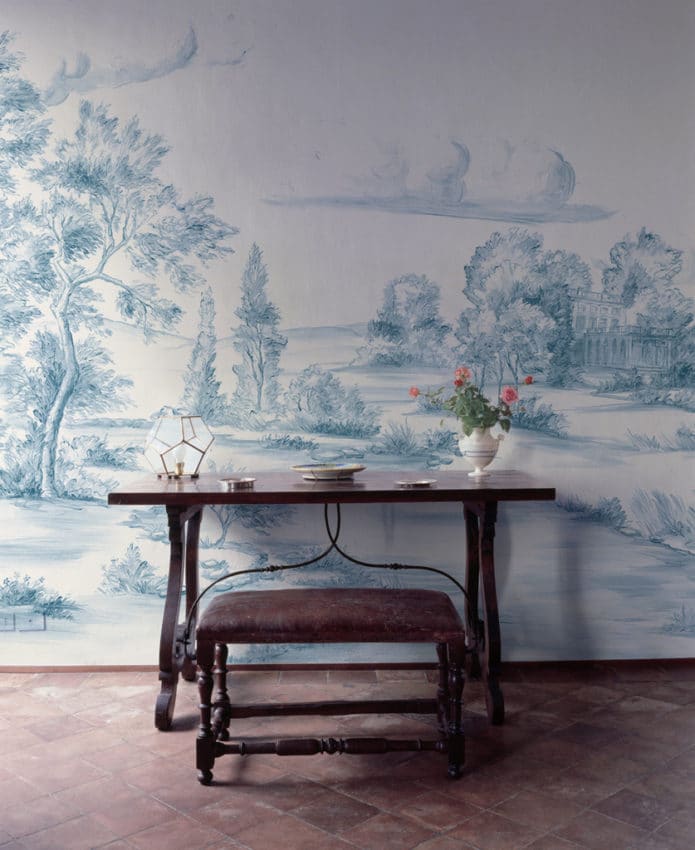 Spare desk with blue scenic mural wallpaper