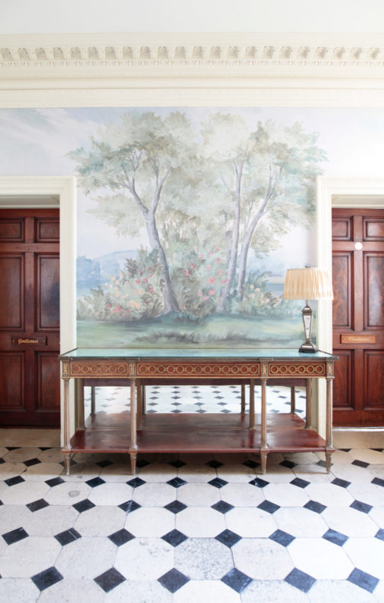 Hedsor House foyer with scenic mural wallpaper
