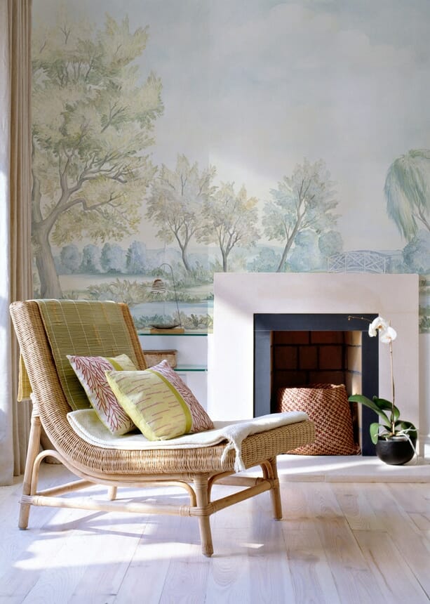 Lounge chair with fireplace and scenic mural wallpaper