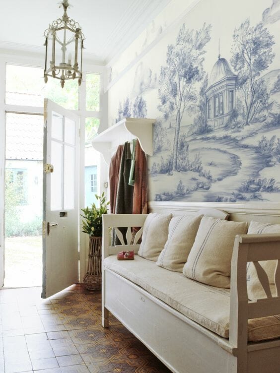 blue and white handpainted landscape printed scenic mural wallpaper in entryway foyer hallway