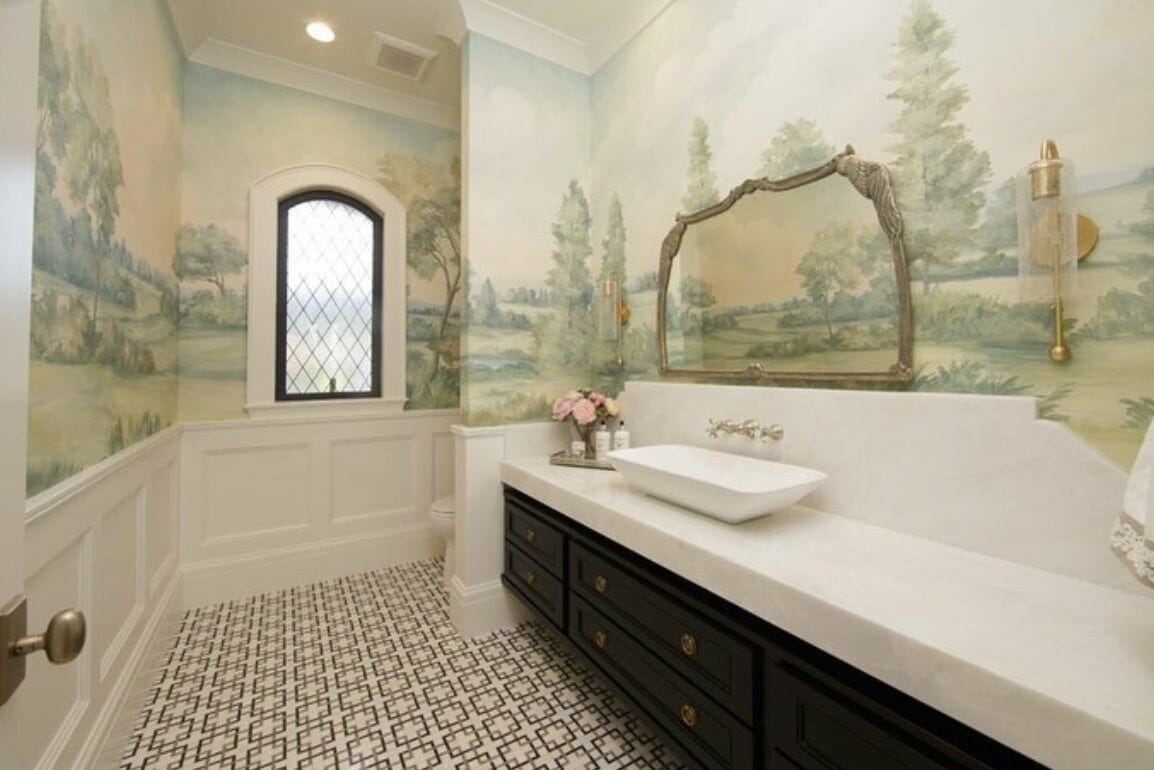classic contemporary bathroom powder room design with black and white floor and counter with colorful soft landscape mural